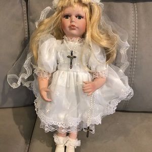 Porcelain christening doll